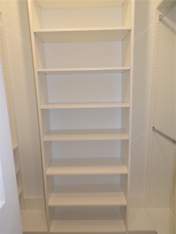 14271 Heritage Landing Boulevard, Unit 1526 Punta Gorda, FL 33955 - Photo 15 of 41 a view of walk in closet with empty racks