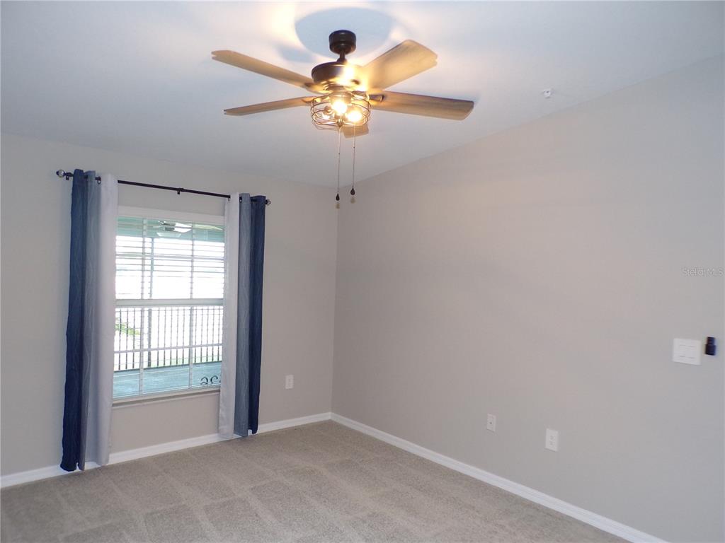 14271 Heritage Landing Boulevard, Unit 1526 Punta Gorda, FL 33955 - Photo 17 of 41 a view of an empty room with a window