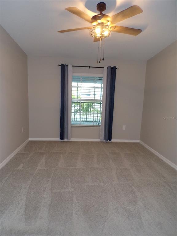 14271 Heritage Landing Boulevard, Unit 1526 Punta Gorda, FL 33955 - Photo 6 of 41 a view of an empty room with a window