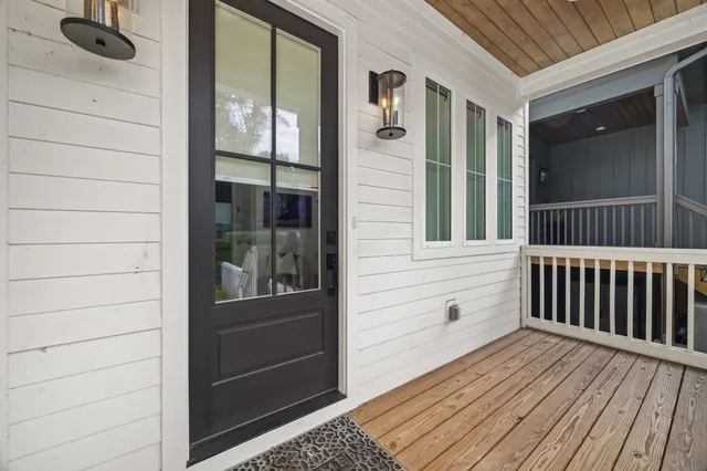 a view of a door and a window