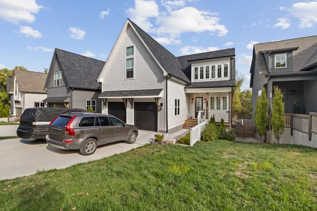 a car parked in front of a house