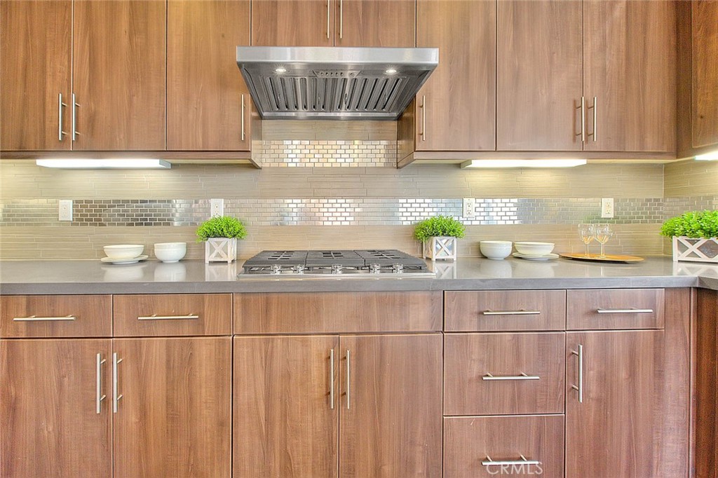 1058 Sunset Boulevard, Unit B Arcadia, CA 91007 - Photo 13 of 45 a kitchen with a sink a stove and cabinets