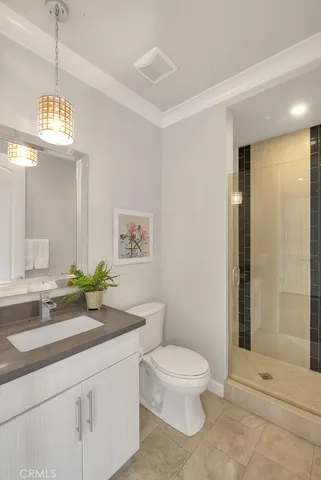 a white bath tub sitting in a bathroom next to a window
