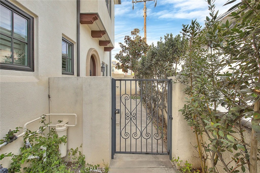 1058 Sunset Boulevard, Unit B Arcadia, CA 91007 - Photo 2 of 45 a front view of a house with a tree