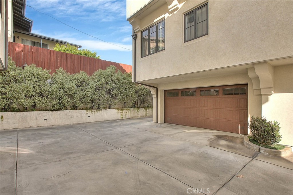 1058 Sunset Boulevard, Unit B Arcadia, CA 91007 - Photo 40 of 45 a view of a house with a garage