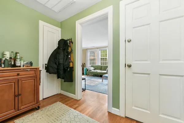 a kitchen with stainless steel appliances granite countertop a refrigerator a stove a sink and a microwave