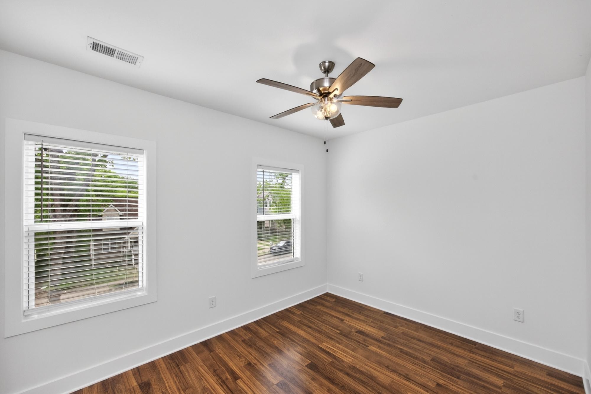 7 Decatur Street Nashville, TN 37210 - Photo 37 of 43 a view of empty room with wooden floor and fan