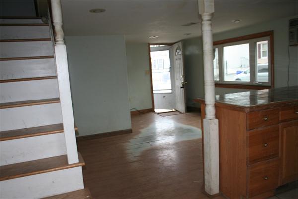 394 Hartwell Street Fall River, MA 02721 - Photo 5 of 7 wooden floor in an empty room with a window