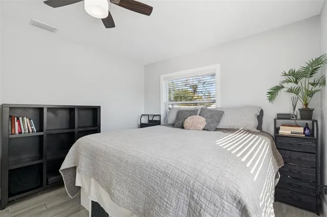 a kitchen with a sink cabinets and window