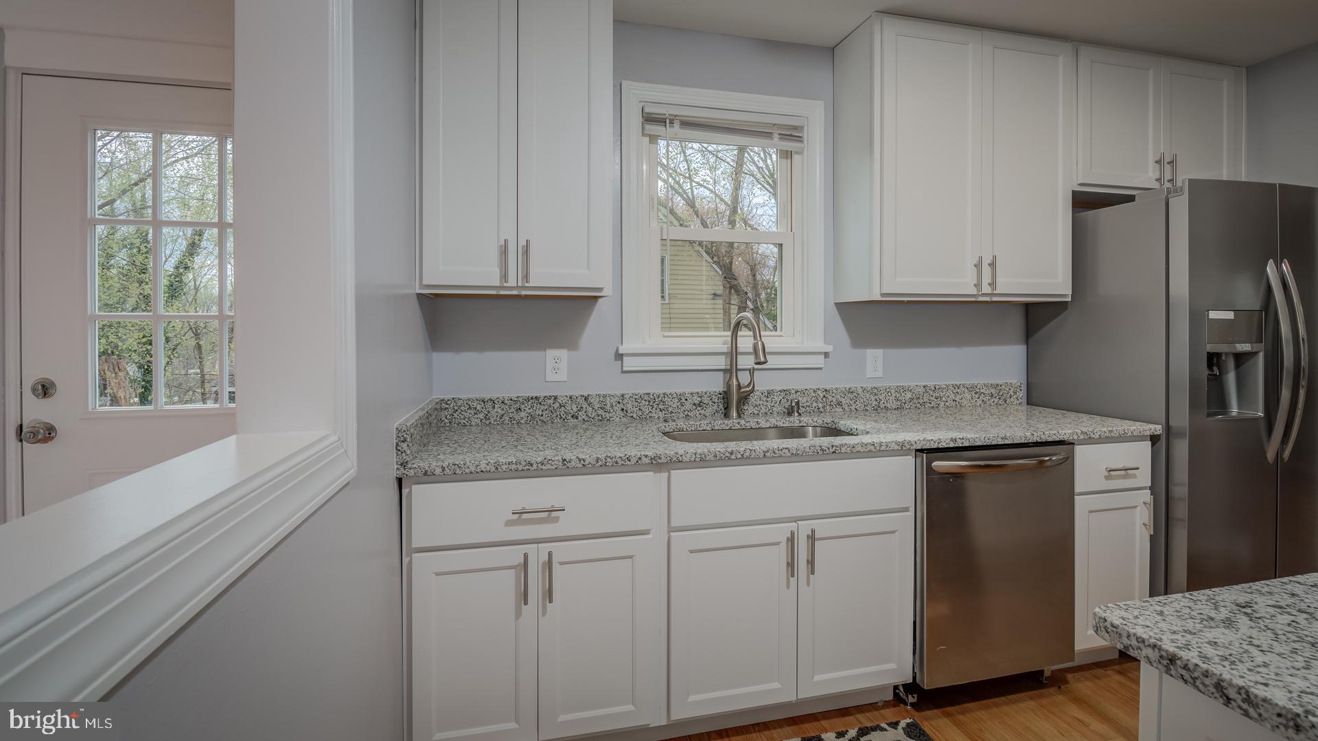 2808 Urbana Drive Silver Spring, MD 20906 - Photo 9 of 39 New granite counters and cabinets