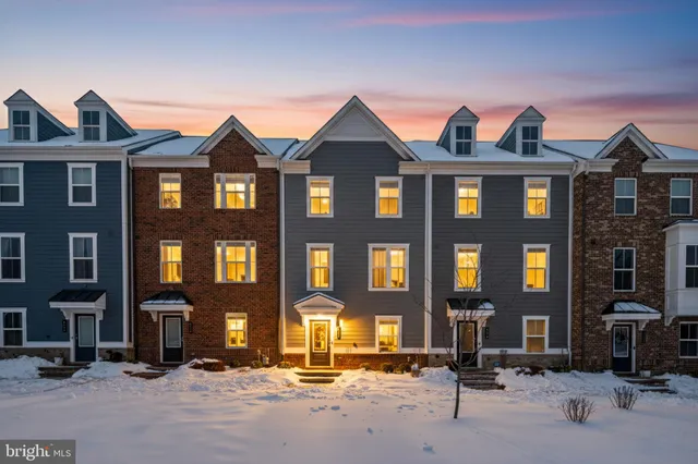 a kitchen with granite countertop stainless steel appliances and wooden cabinets