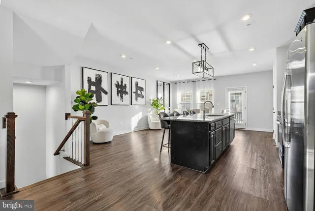 a bathroom with a sink toilet and mirror