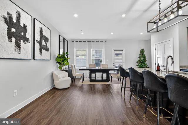 a bedroom with a bed and a mirror