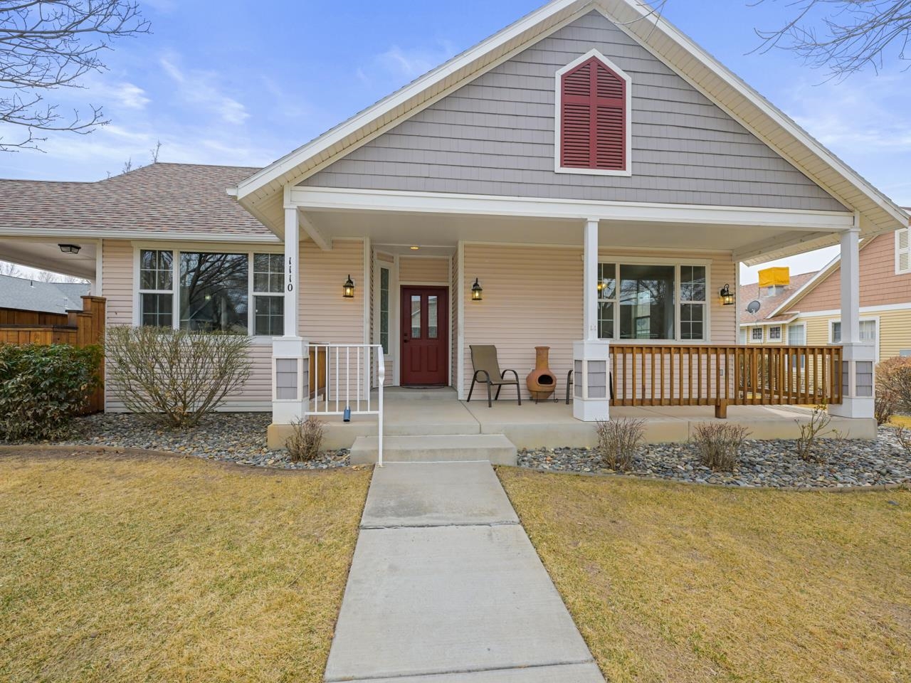 1110 Buttercup Lane Fruita, CO 81521 - Photo 1 of 27 a front view of a house with a porch