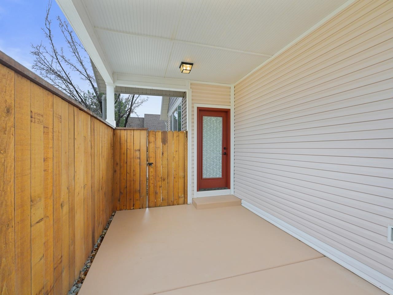 1110 Buttercup Lane Fruita, CO 81521 - Photo 22 of 27 a view of a porch with wooden floor