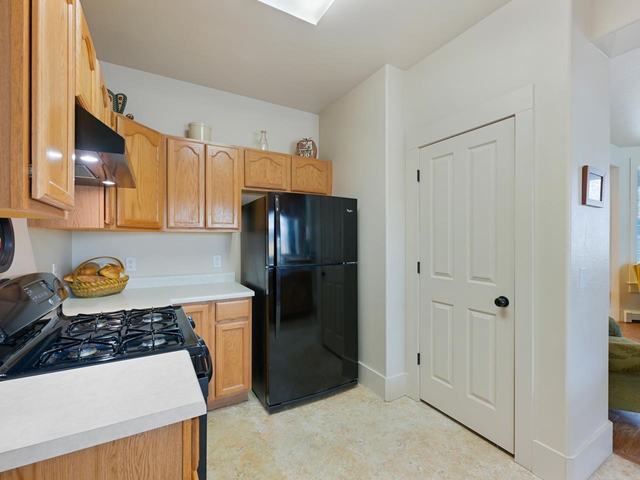 1110 Buttercup Lane Fruita, CO 81521 - Photo 5 of 27 a kitchen with stainless steel appliances granite countertop a refrigerator and a stove