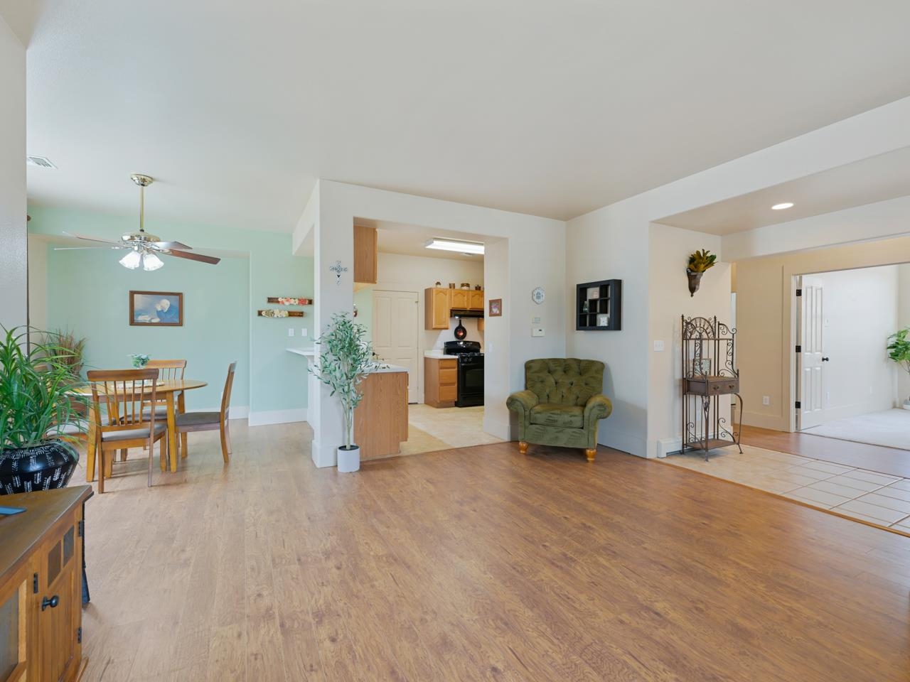 1110 Buttercup Lane Fruita, CO 81521 - Photo 8 of 27 a living room with furniture and wooden floor