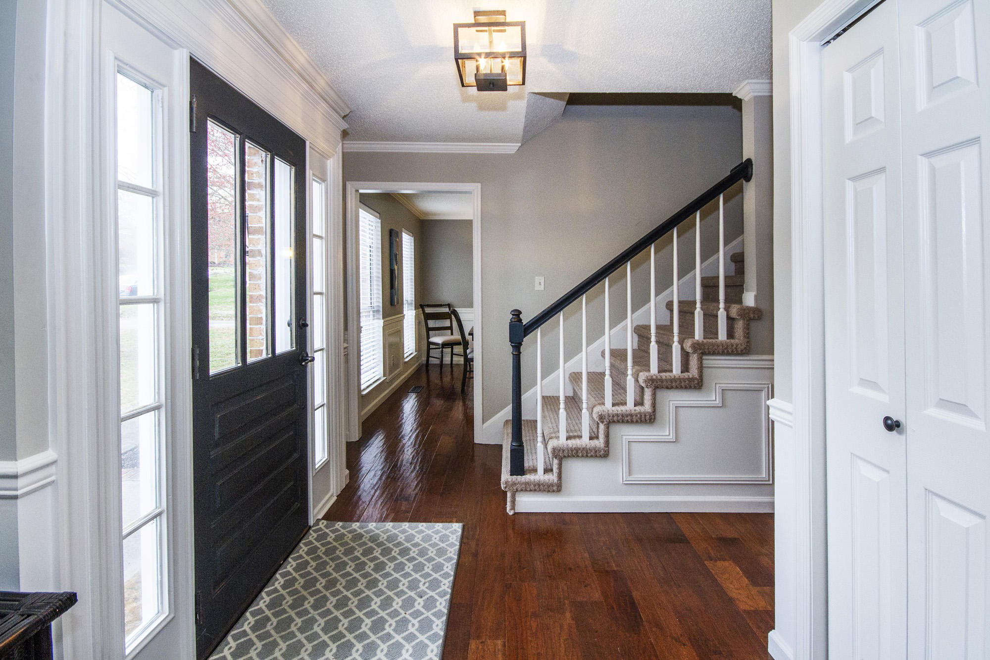 229 Long Bow Road Knoxville, TN 37934 - Photo 11 of 38 a view of staircase with lots of frames on wall and windows
