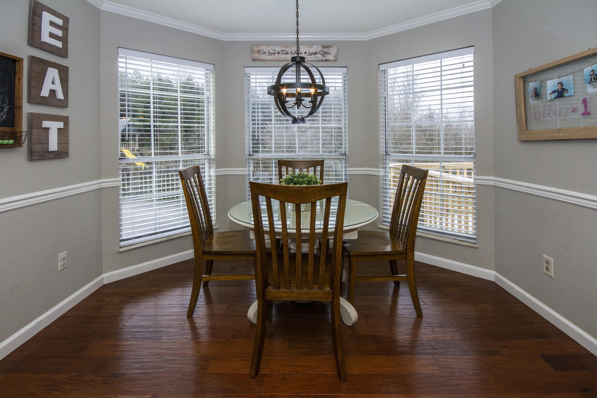 229 Long Bow Road Knoxville, TN 37934 - Photo 18 of 38 a view of a dining room with furniture window and wooden floor