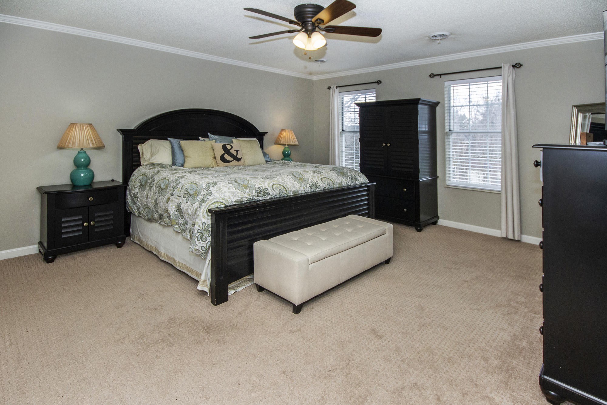 229 Long Bow Road Knoxville, TN 37934 - Photo 24 of 38 a bedroom with a bed and a ceiling fan