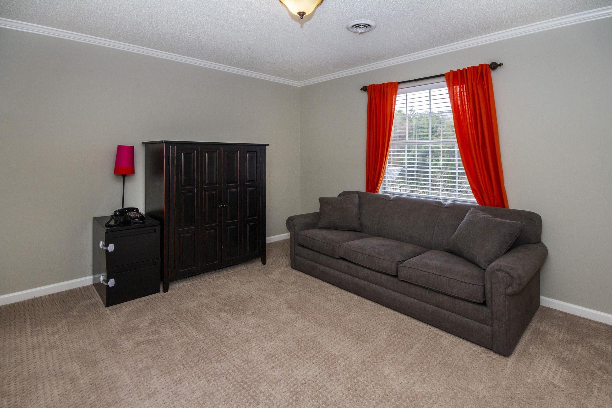 229 Long Bow Road Knoxville, TN 37934 - Photo 29 of 38 a living room with furniture and a window