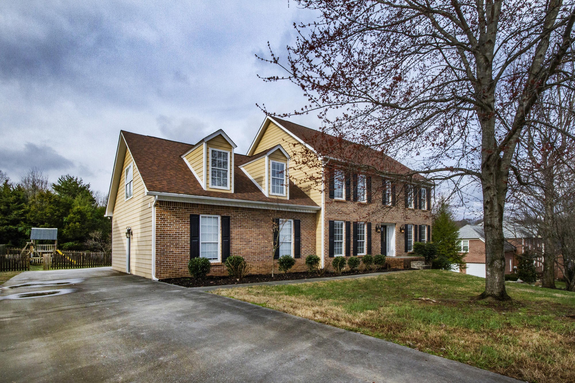 229 Long Bow Road Knoxville, TN 37934 - Photo 34 of 38 front view of a house with a yard