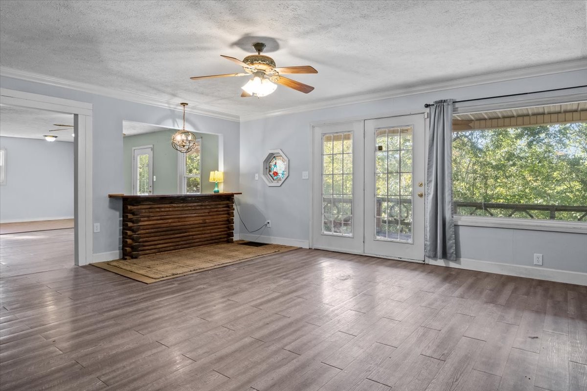 3316 Toms Creek Road Linden, TN 37096 - Photo 14 of 44 a view of a room with wooden floor and window