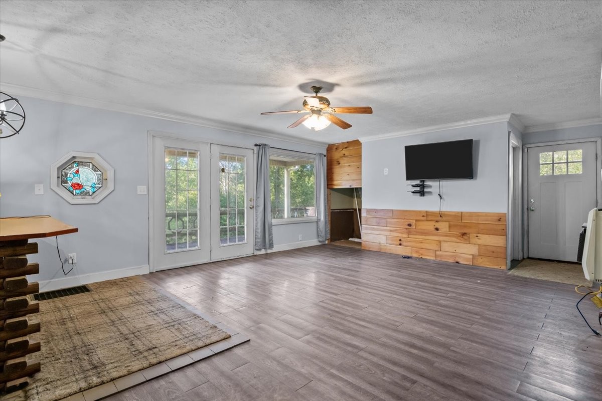 3316 Toms Creek Road Linden, TN 37096 - Photo 16 of 44 wooden floor in an empty room with a window