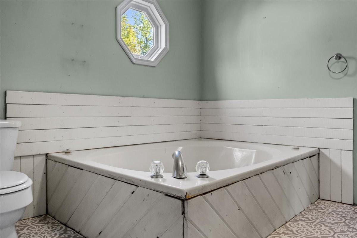 3316 Toms Creek Road Linden, TN 37096 - Photo 21 of 44 a bathroom with a sink and a toilet