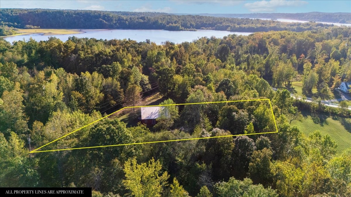 3316 Toms Creek Road Linden, TN 37096 - Photo 33 of 44 a view of a lake from a balcony