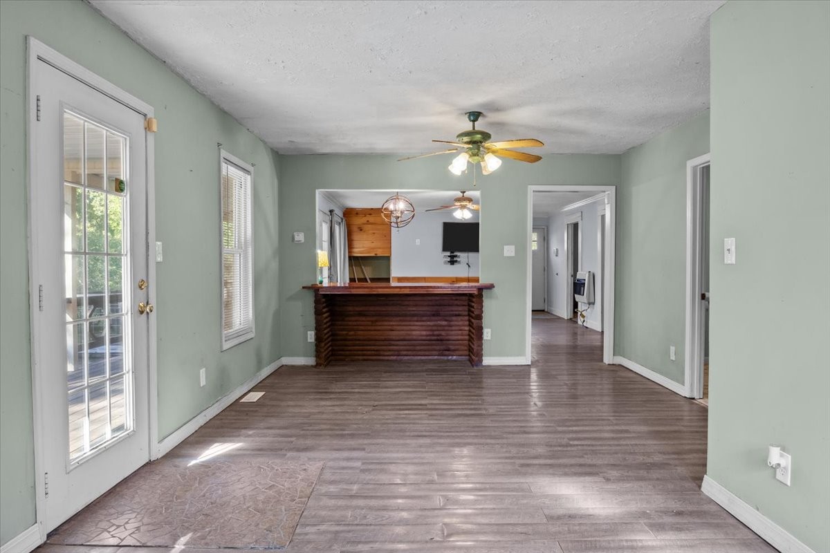 3316 Toms Creek Road Linden, TN 37096 - Photo 37 of 44 a view of a hallway with front door and wooden floor