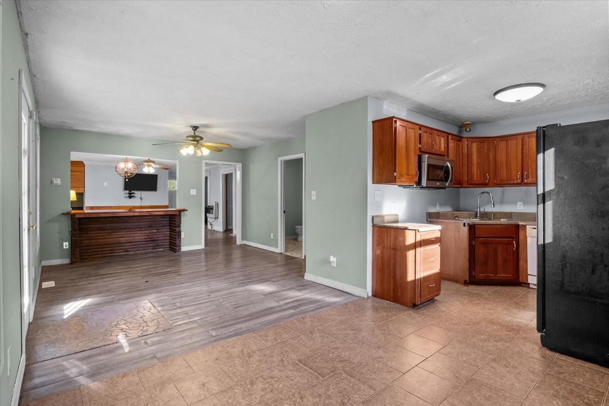 3316 Toms Creek Road Linden, TN 37096 - Photo 41 of 44 a view of kitchen and refrigerator