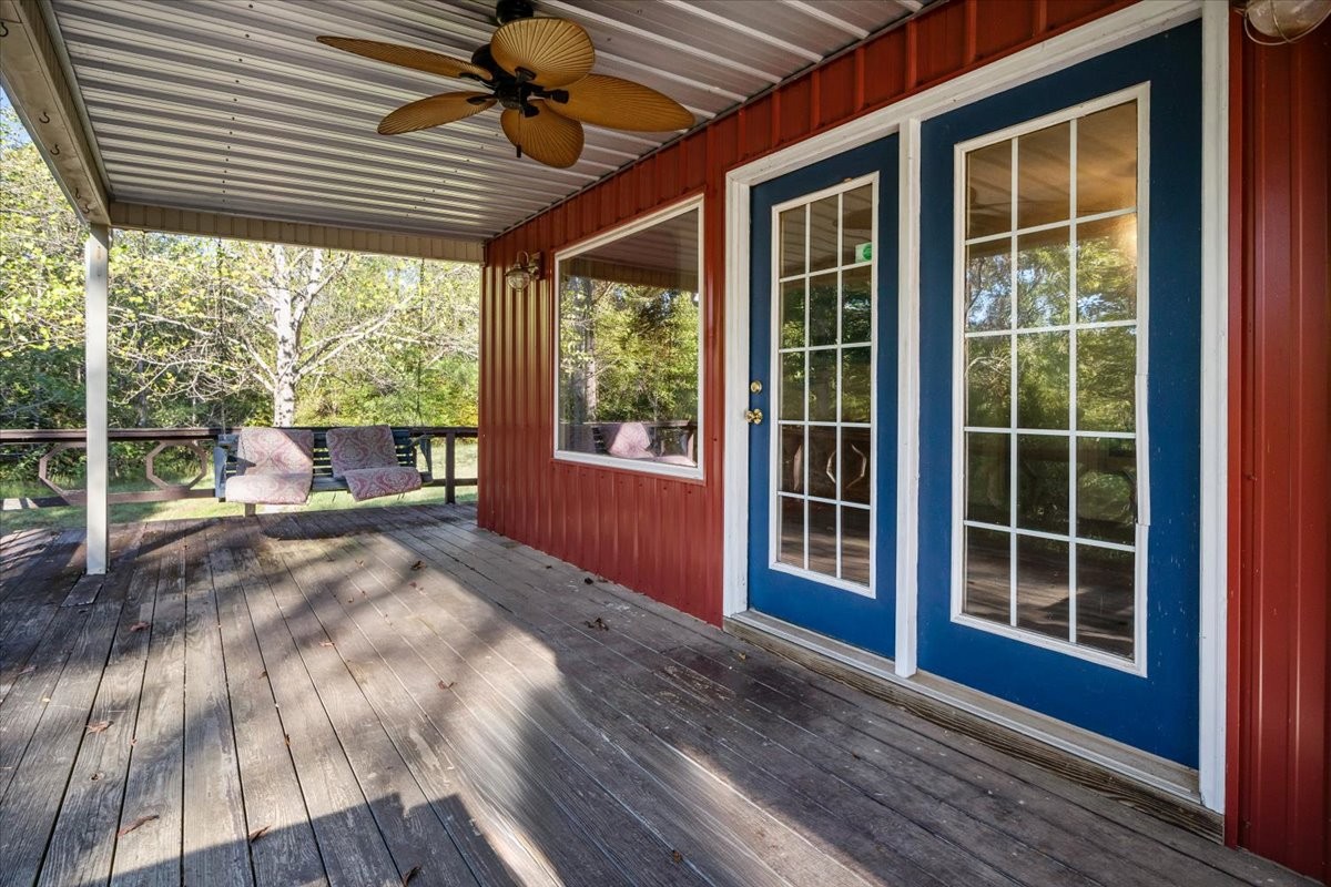 3316 Toms Creek Road Linden, TN 37096 - Photo 5 of 44 a view of empty room with wooden floor and fan