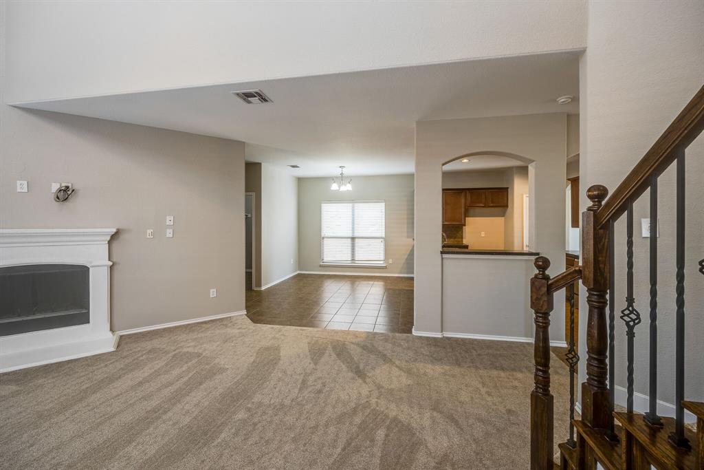2228 Canyon Point McKinney, TX 75071 - Photo 16 of 40 a view of an empty room and fire place