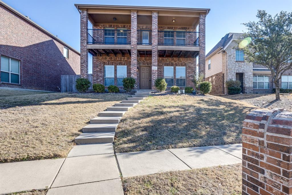 2228 Canyon Point McKinney, TX 75071 - Photo 2 of 40 a front view of a building