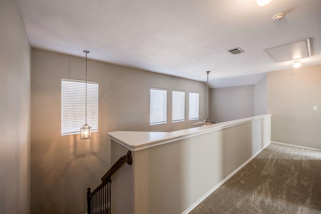 2228 Canyon Point McKinney, TX 75071 - Photo 23 of 40 a room with a window