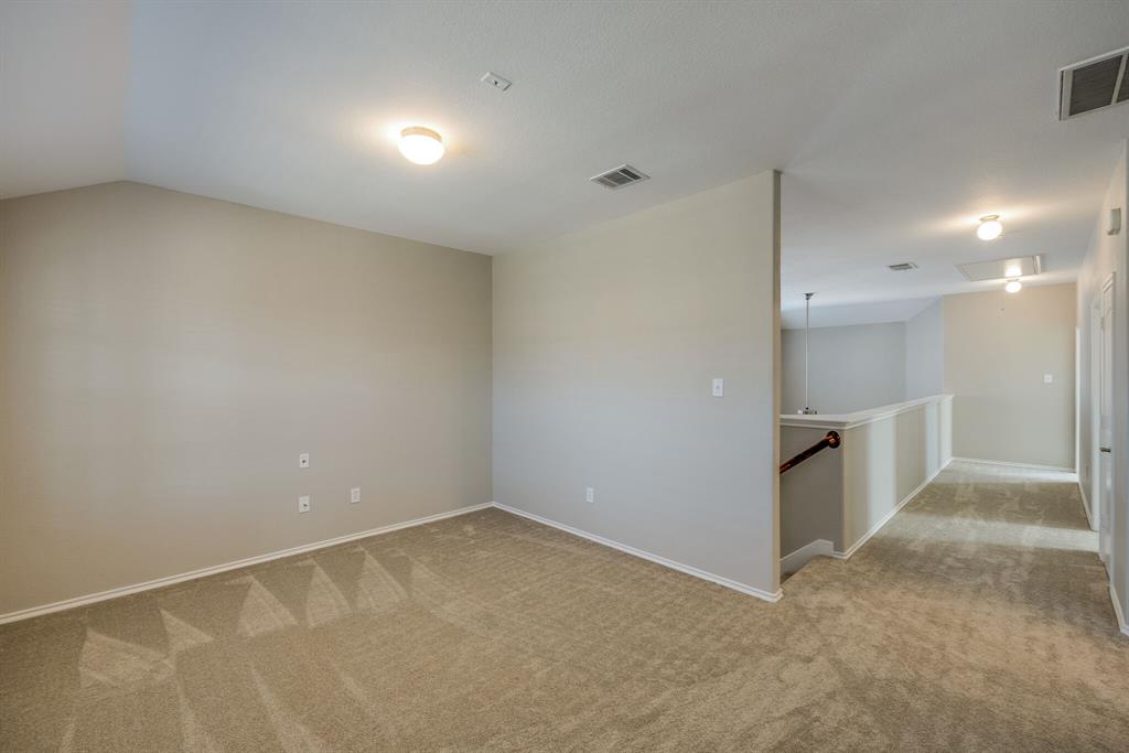 2228 Canyon Point McKinney, TX 75071 - Photo 26 of 40 an empty room with a empty space and windows