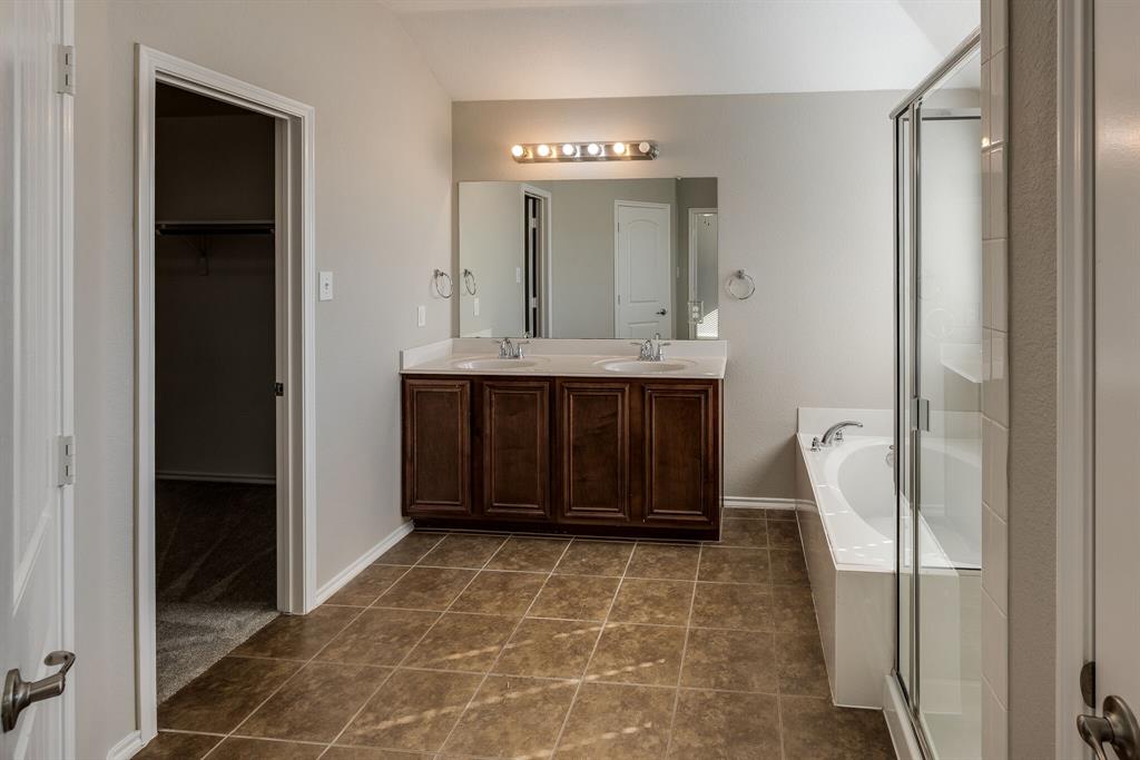2228 Canyon Point McKinney, TX 75071 - Photo 34 of 40 a bathroom with a sink and a mirror