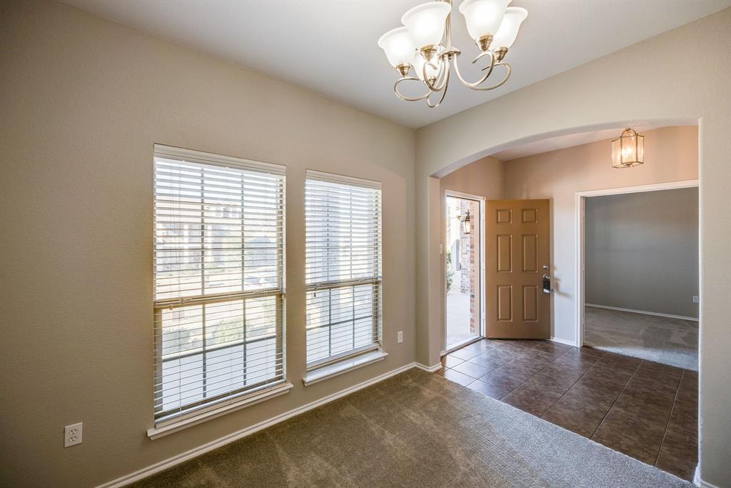 2228 Canyon Point McKinney, TX 75071 - Photo 8 of 40 a view of an empty room with a window