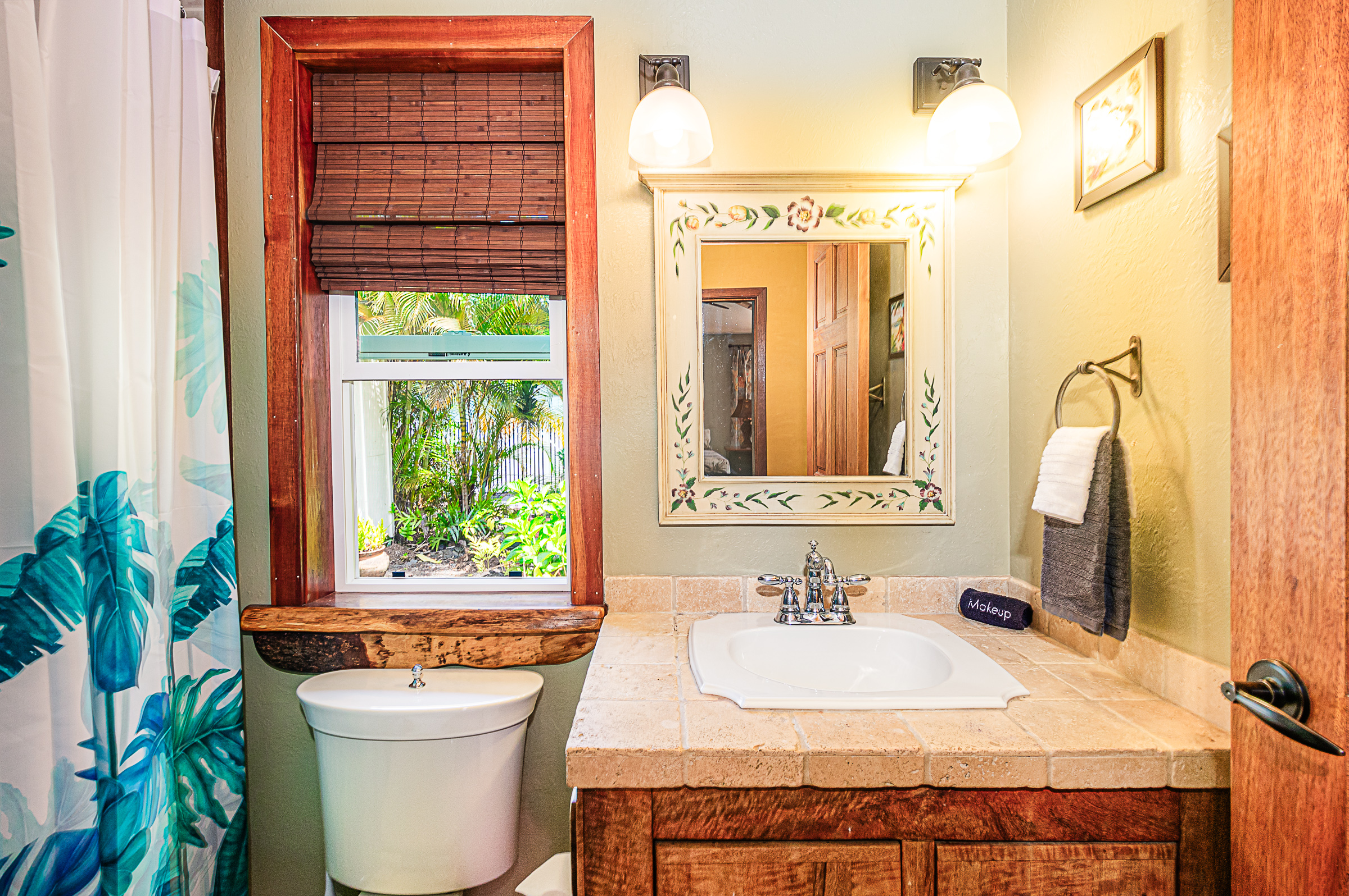 15-869 Lemiwai Road Keaau, HI 96749 - Photo 14 of 30 a bathroom with a sink toilet and mirror
