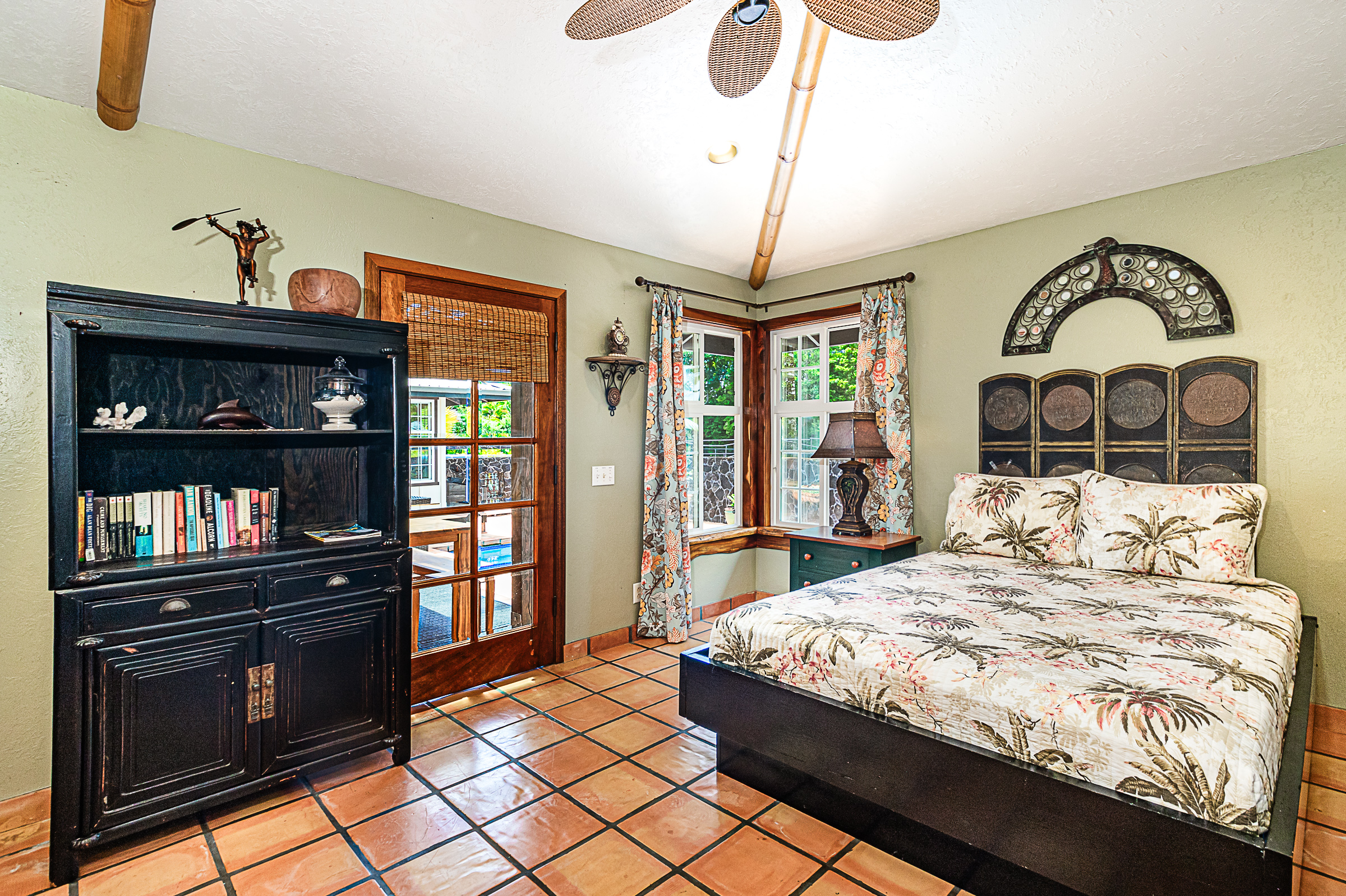 15-869 Lemiwai Road Keaau, HI 96749 - Photo 15 of 30 a bedroom with a bed and dresser