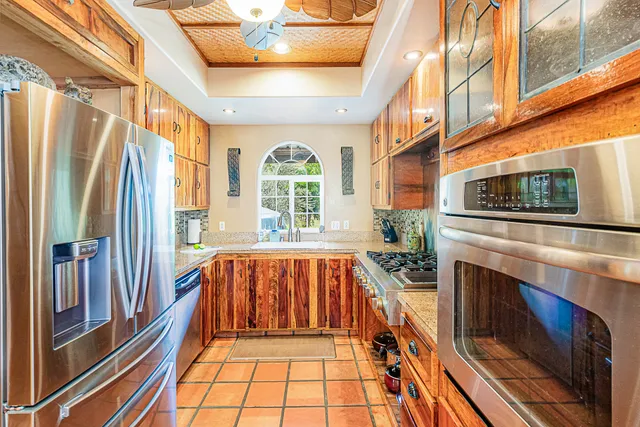 a view of a dining table and chairs
