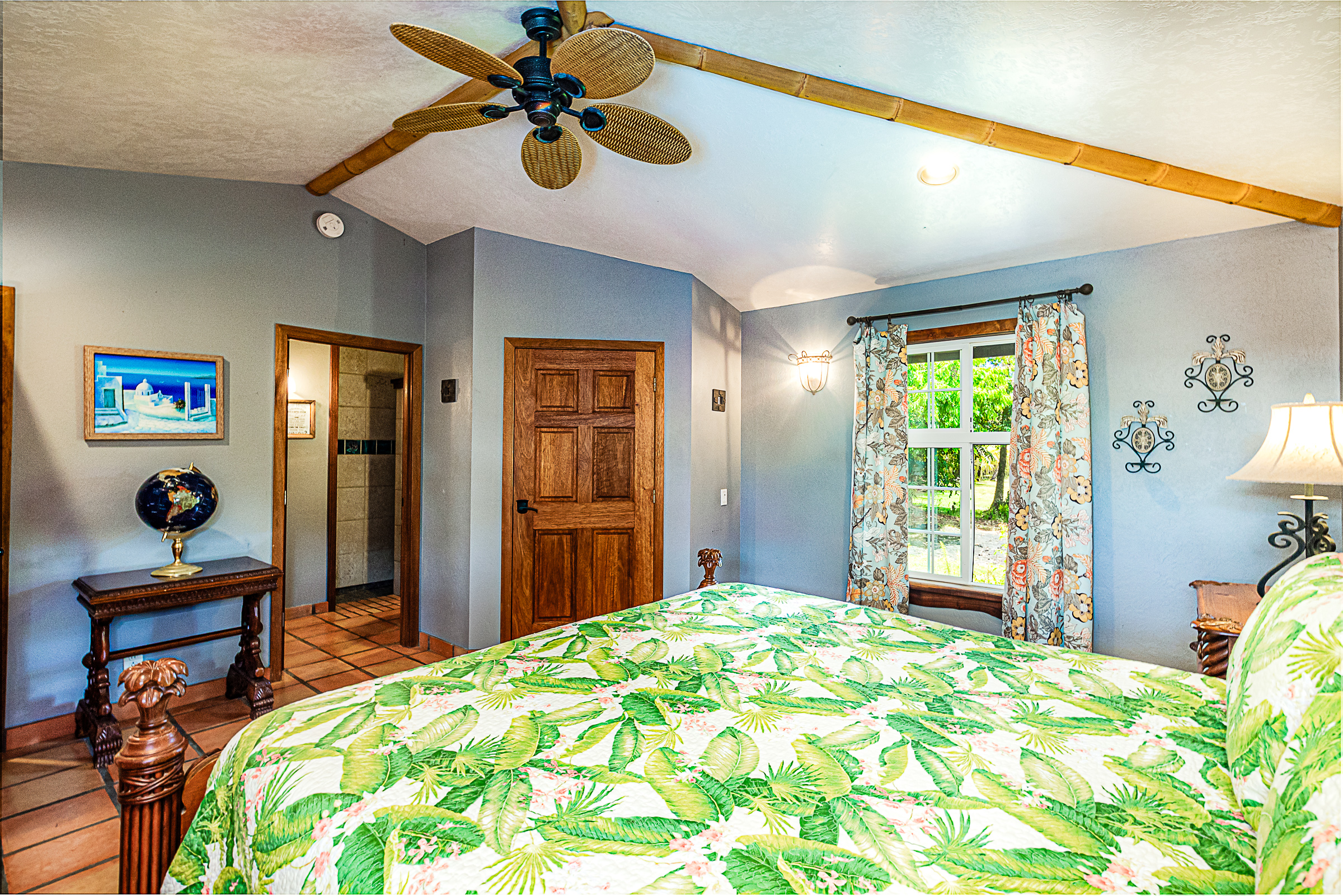 15-869 Lemiwai Road Keaau, HI 96749 - Photo 23 of 30 a bedroom with a bed and furniture