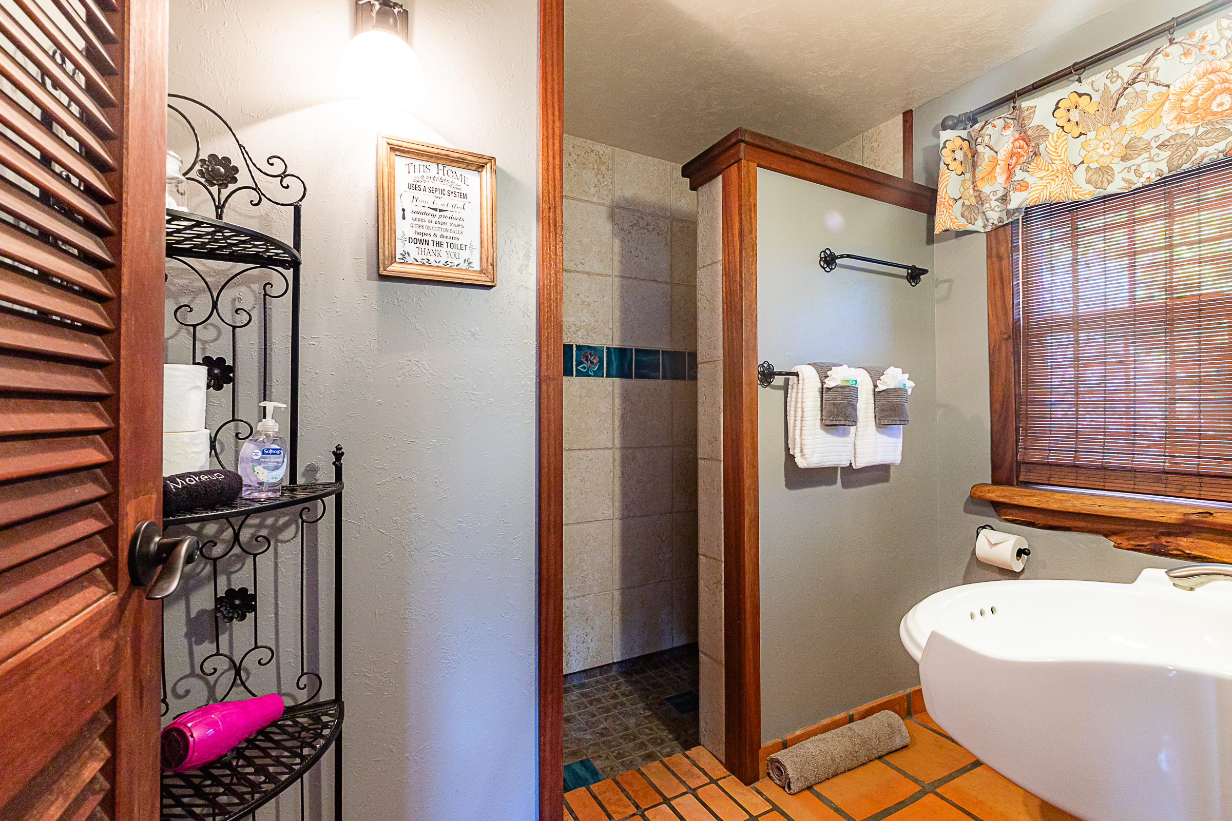 15-869 Lemiwai Road Keaau, HI 96749 - Photo 24 of 30 a bathroom with a bathtub and shower