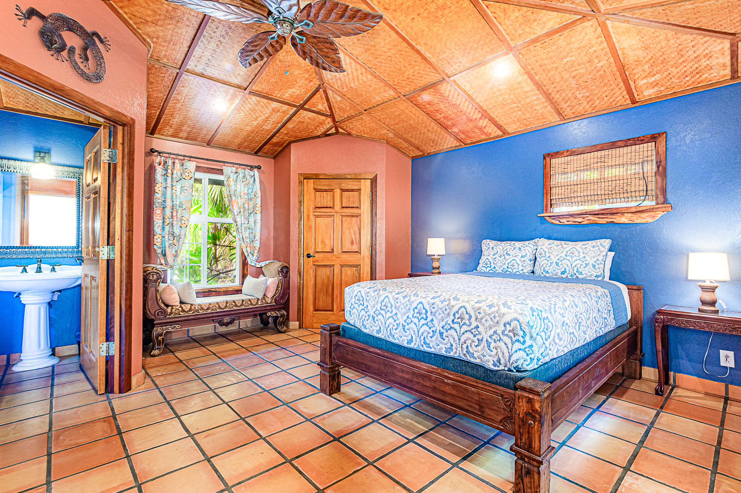 15-869 Lemiwai Road Keaau, HI 96749 - Photo 8 of 30 a bedroom with a bed and a view of bathroom