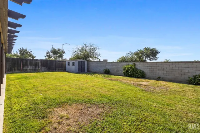 a view of a swimming pool and an outdoor space