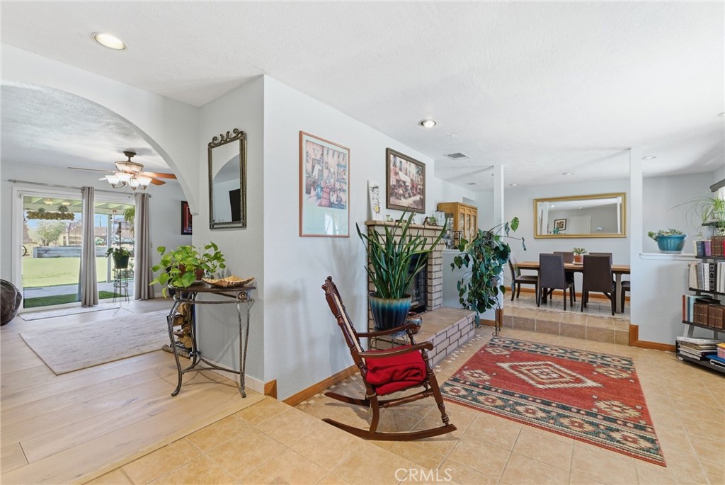 7868 Arrowhead Lake Road Hesperia, CA 92345 - Photo 2 of 48 a work room with furniture potted plant and a window