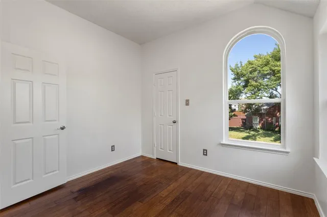 a bathroom with a sink toilet and a mirror