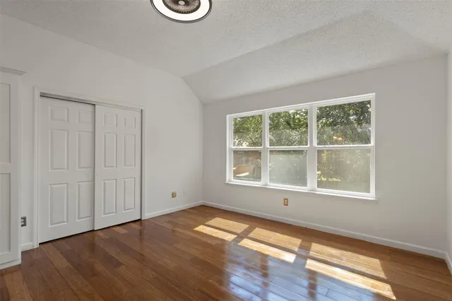 a bathroom with a toilet a sink and a mirror