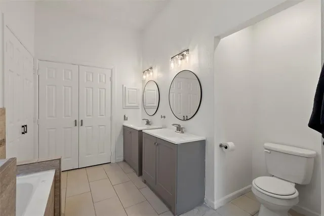 a bathroom with a bathtub and a sink